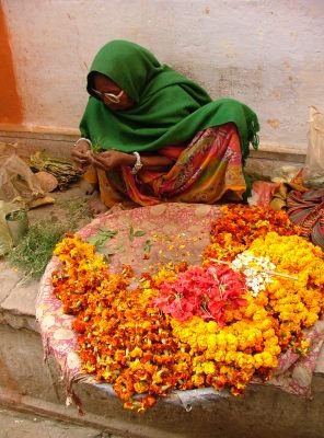 Indian woman selling flowers